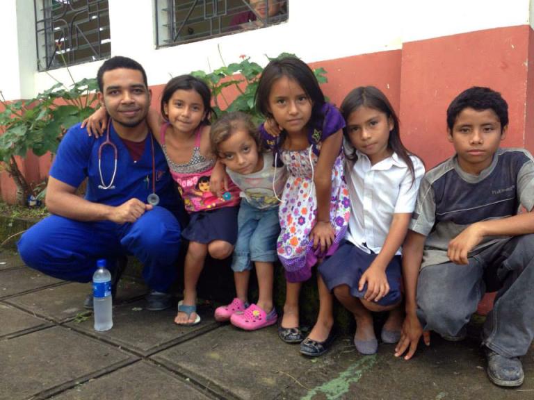 Amar Mukhtar with children on a medical mission trip