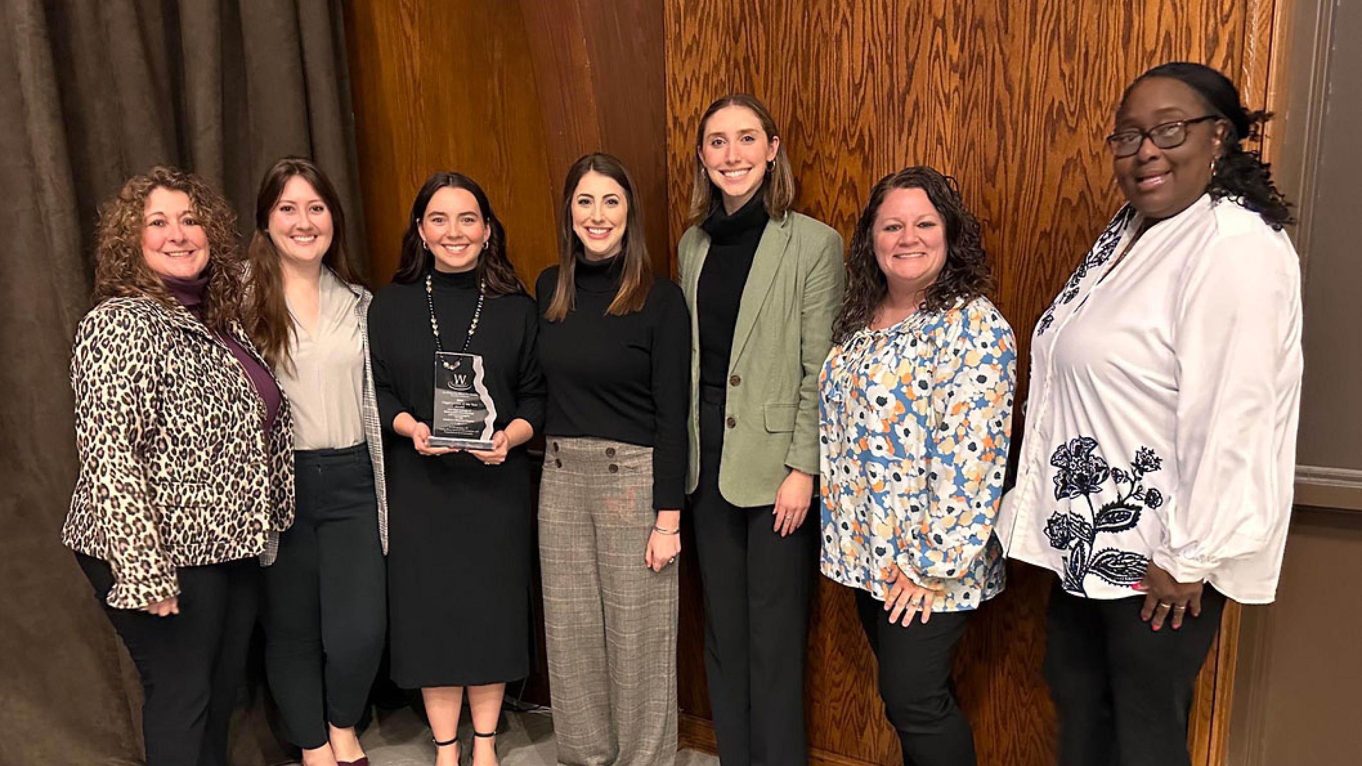 VCOM-Louisiana ACOOG Chapter members holding award