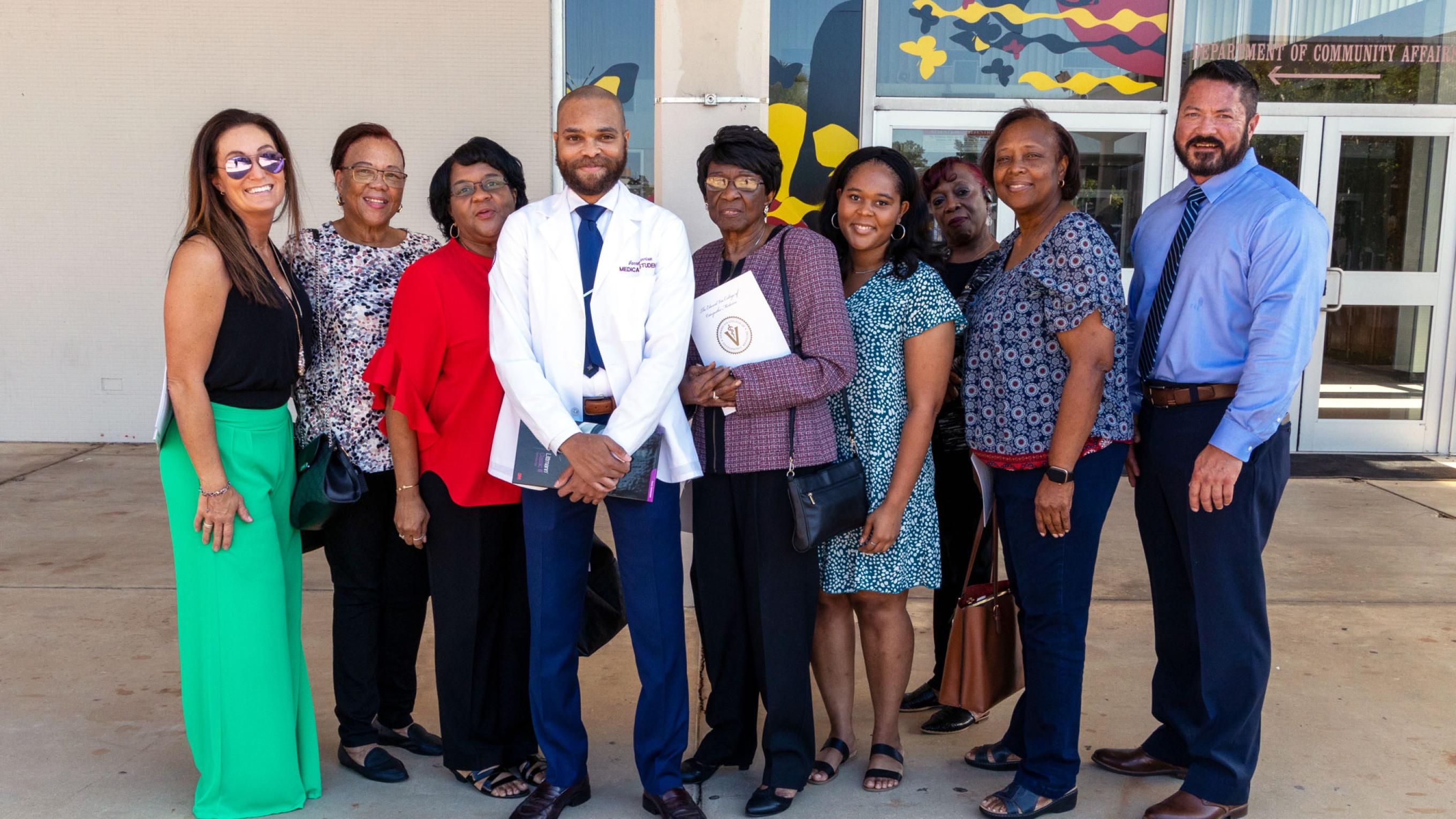 VCOM-Louisiana student with family