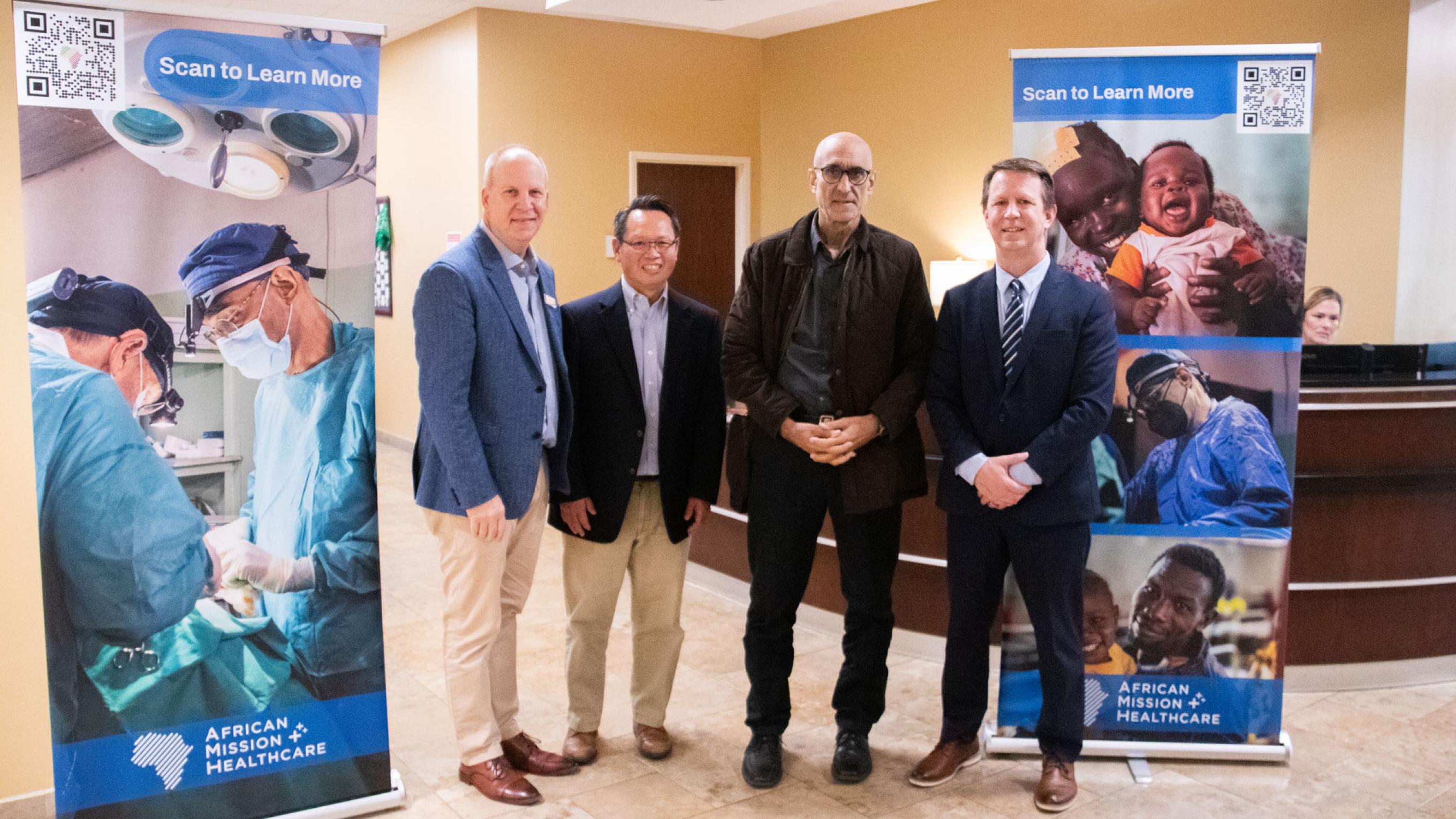 Tom Catena, MD, VCOM-Carolinas Dean Matthew Cannon, DO, FACOFP, and others smiling