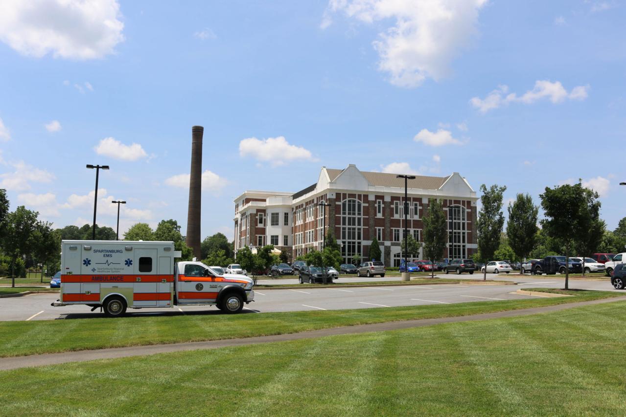 Carolinas campus building with ambulance