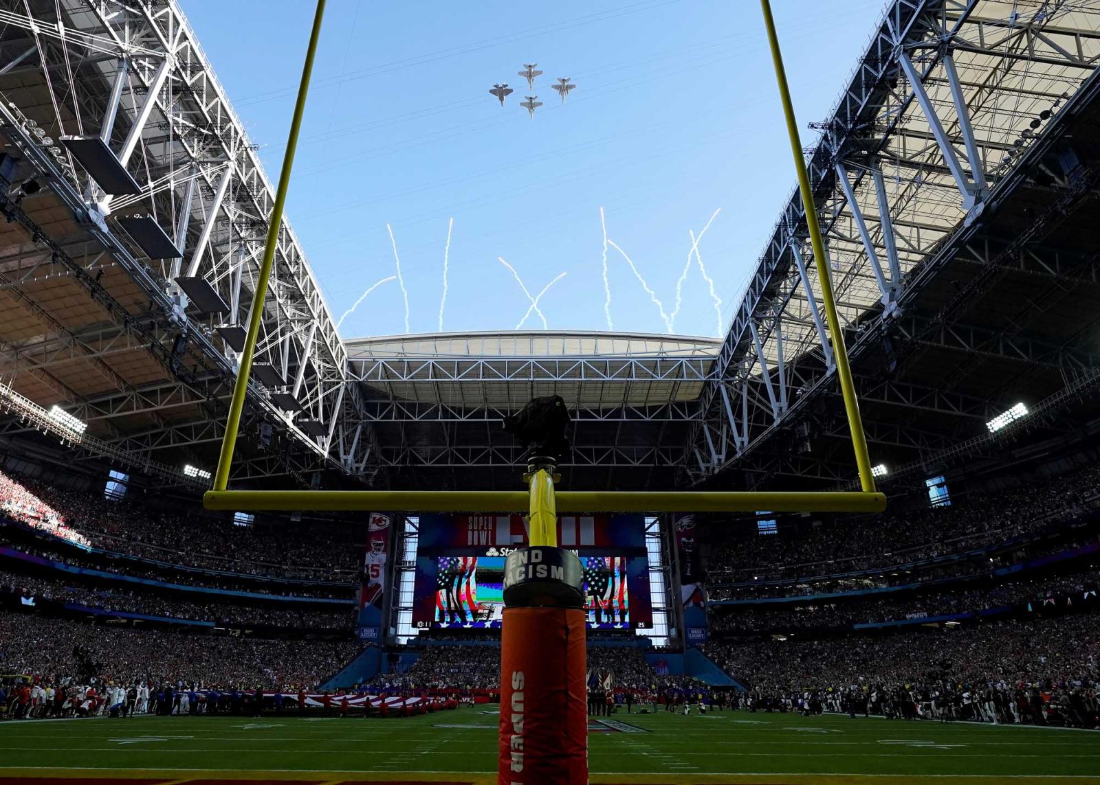 Taylor Rudolph flying over super bowl stadium
