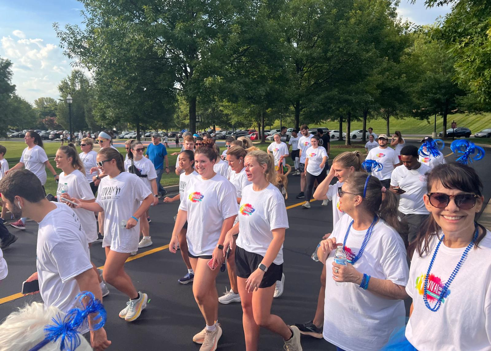 Runners jogging in a large group