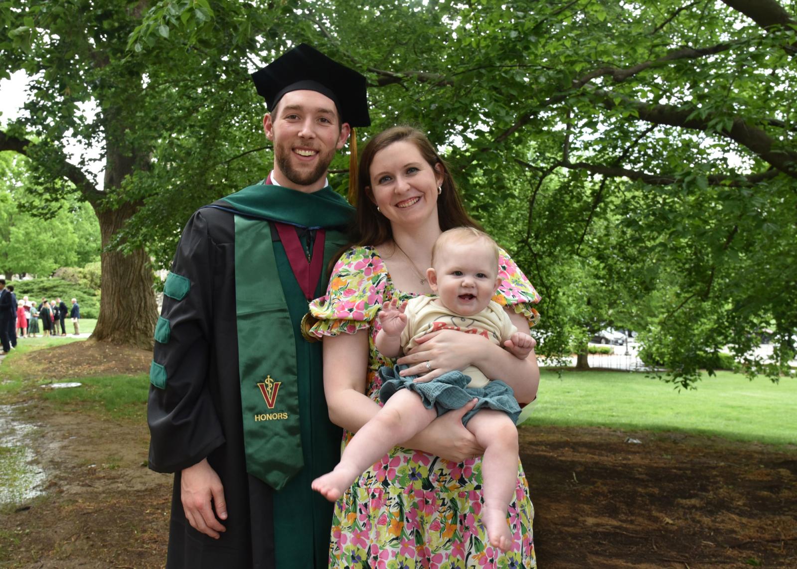 VCOM-Virginia class of 2025 graduate with his wife and cute baby