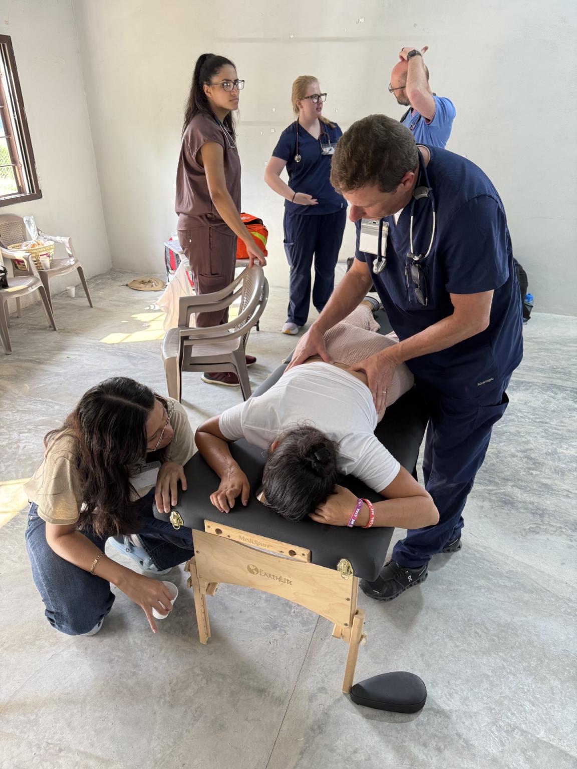 Thomas McKinley practicing OMM