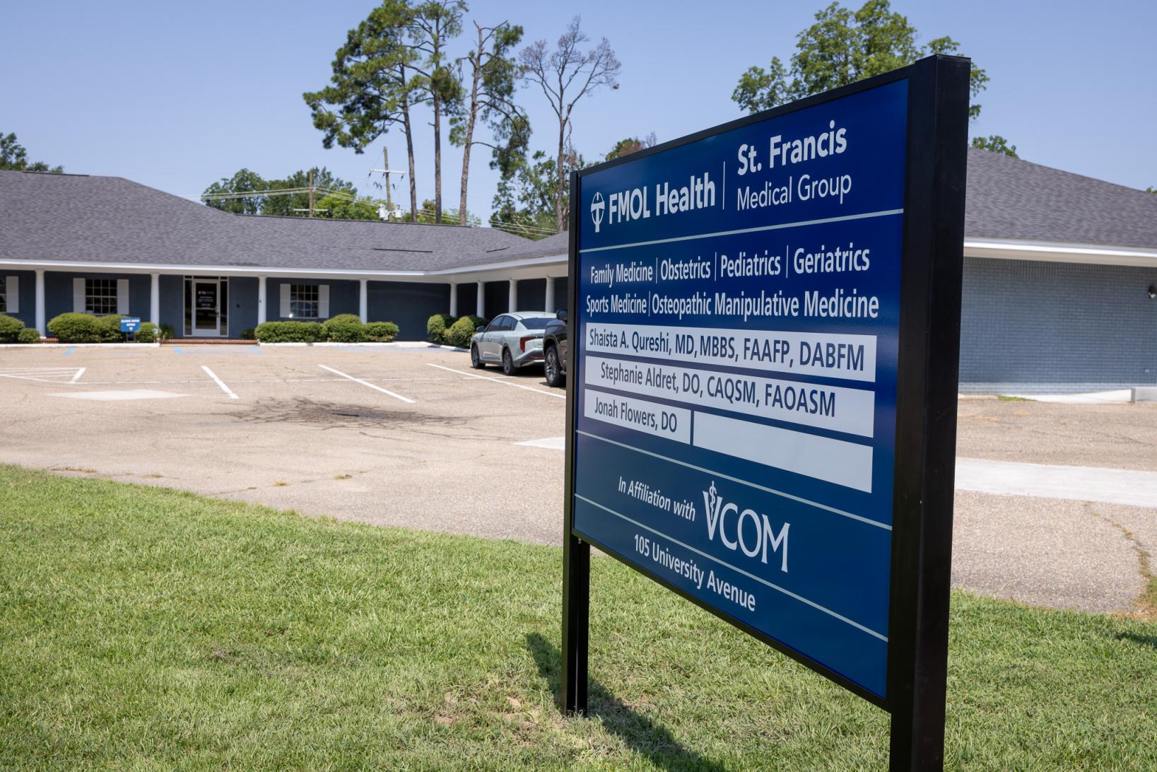 Clinic sign in front of building