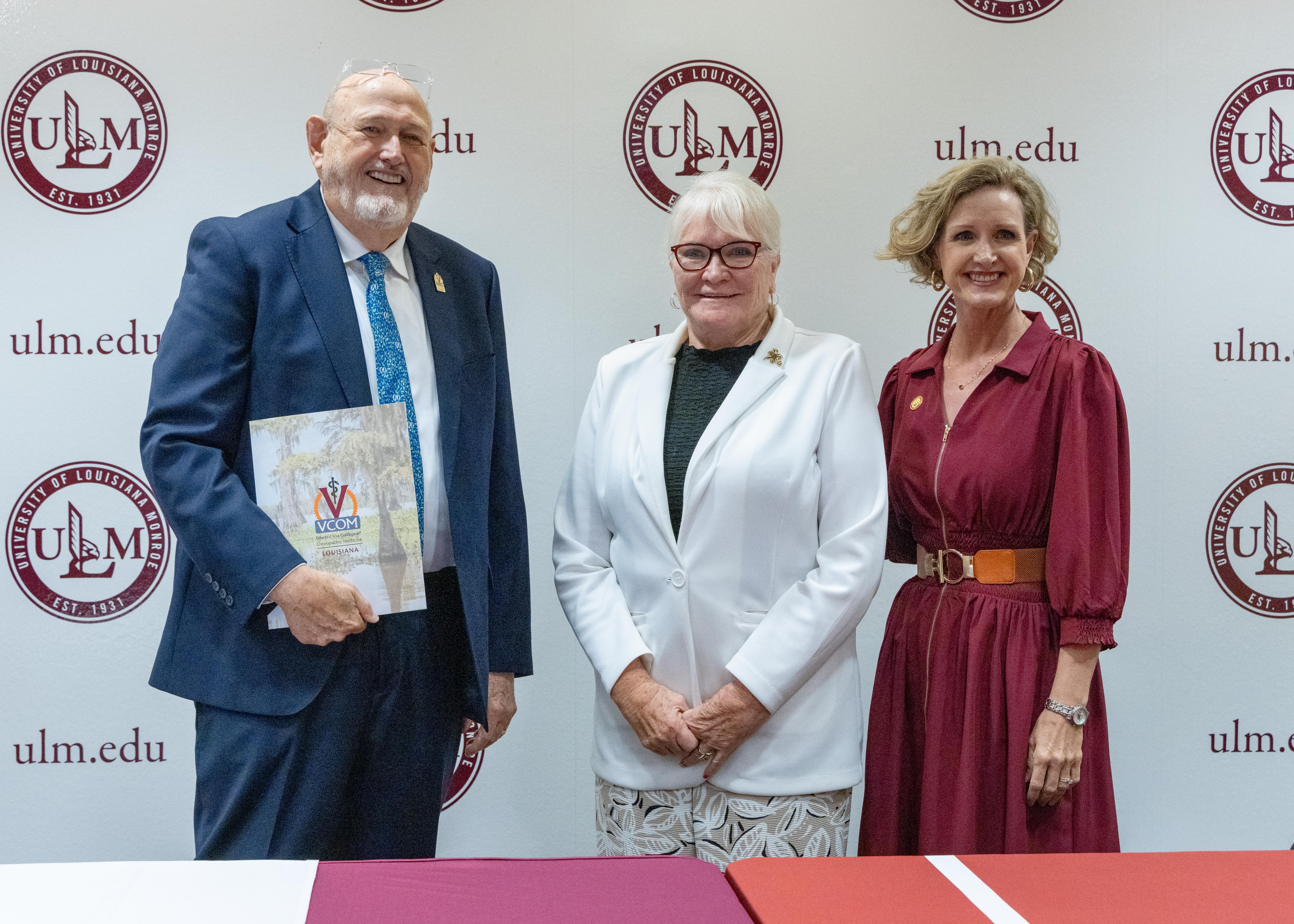 Ray Morrison, Dixie Tooke-Rawlins, and Carrie L. Castille smiling