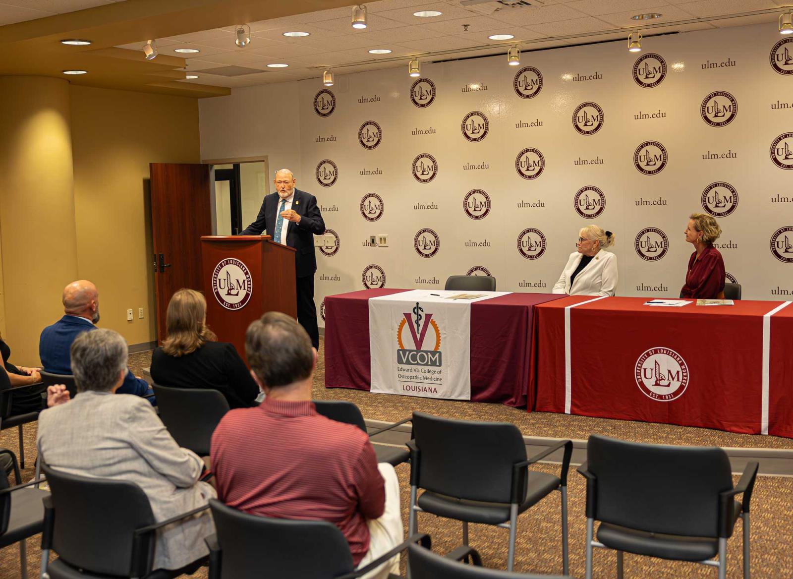 Ray Morrison speaking at a podium