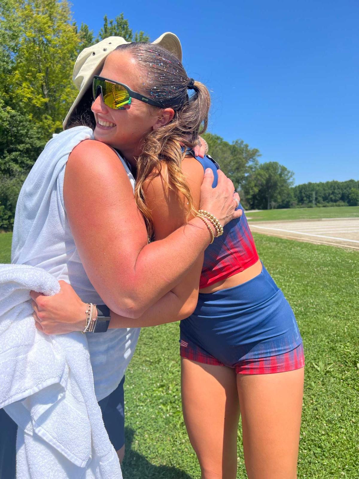 Hannah Hill hugging a family member