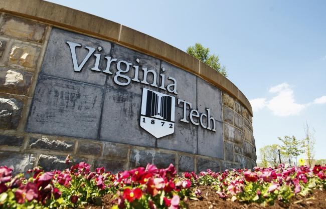 virginia tech campus sign and flowers