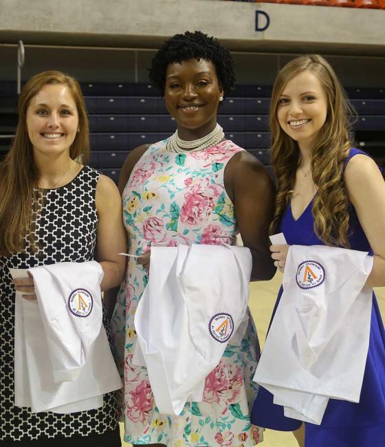 Students at white coat ceremony