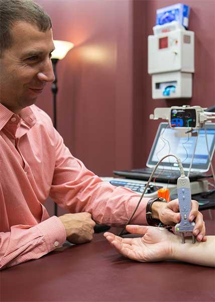 Dr. McCrady working with patient