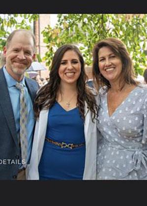 Brittany Davis with parents at white coat ceremony