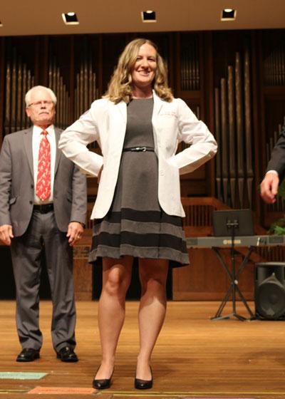 Brooke Hager in white coat