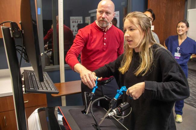 Student using the LAP Mentor Simulator