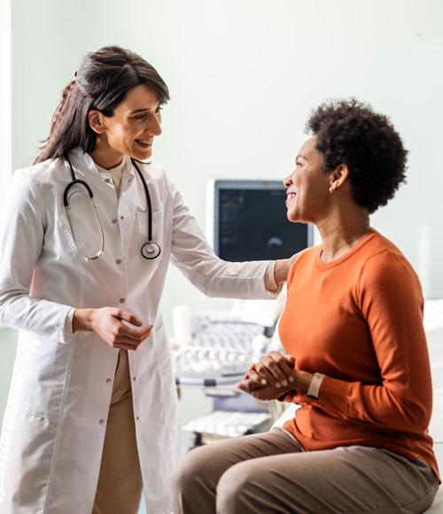 Doctor speaking with patient