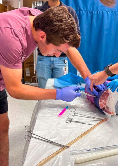 Tyler McCormick in a surgical lab