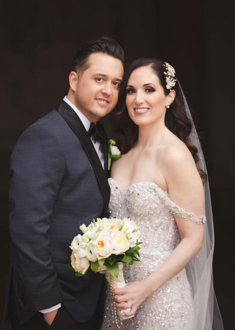 Courtney Pisano with husband in a wedding photo
