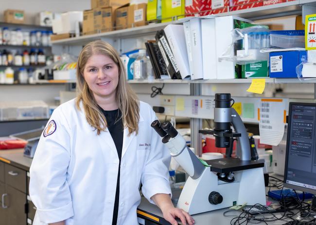Jenna Dittmar, PhD, assistant professor for anatomical science at VCOM-Louisiana, stands in her lab