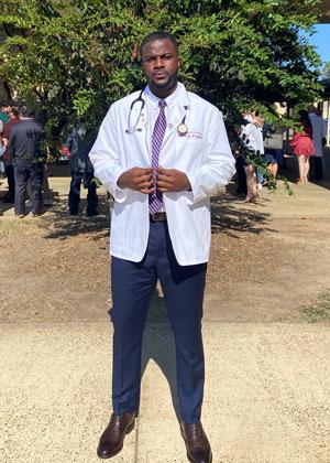 Chinaemerem Chukwudoro in white coat