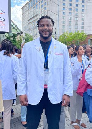 Chinaemerem Chukwudoro in white coat