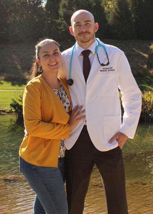 Morgan Hill in his white coat
