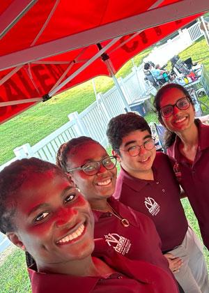 Ade Ojimi with fellow students at an outreach fair