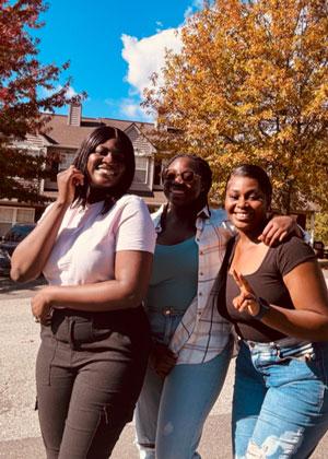 Ade Ojimi posing with friends