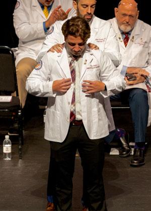 Michael Paunove coated during white coat ceremony