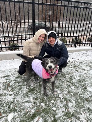 Carlos Jimenez, Jr. with his girlfriend and their dog