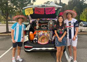 Carlos Jimenez, Jr. at a trunk or treat student organization event