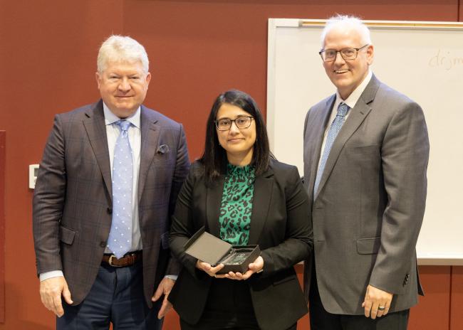 Dr Brolinson and Dean Sanders with Research Day winner