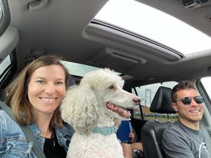 Car Barrick with his wife and dog