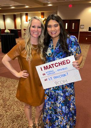 Allison Tran, DO holding her match day sign