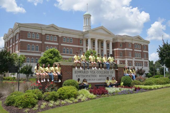 Summer Enrichment Experience attendees in front of VCOM-Auburn building.