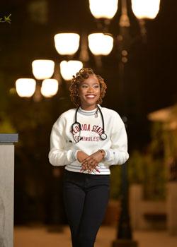 Shelda St. Preux wearing a Florida State sweatshirt with stethoscope around her neck