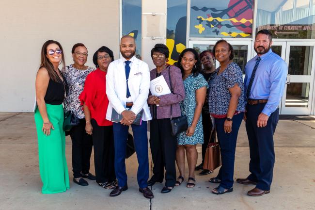VCOM-Louisiana student with family