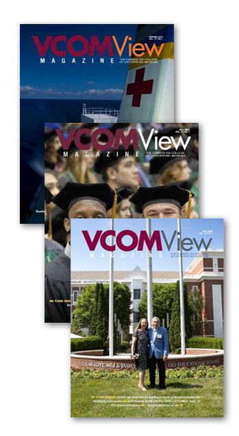 Three VCOM view magazines stacked diagonally