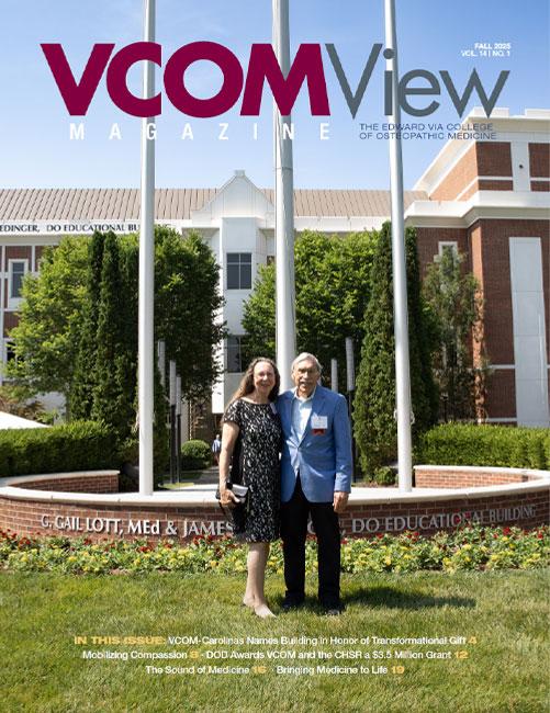 VCOM View magazine cover with two people standing in front of VCOM-Carolinas campus
