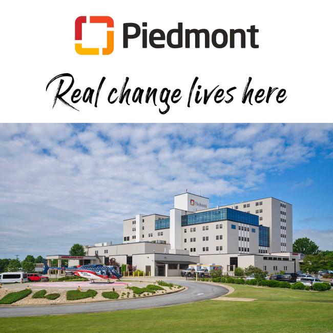 Piedmont Midtown hospital building with helicopter in front