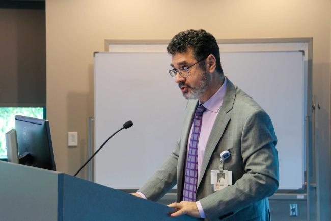 Hanna Sahhar, MD speaking at a podium