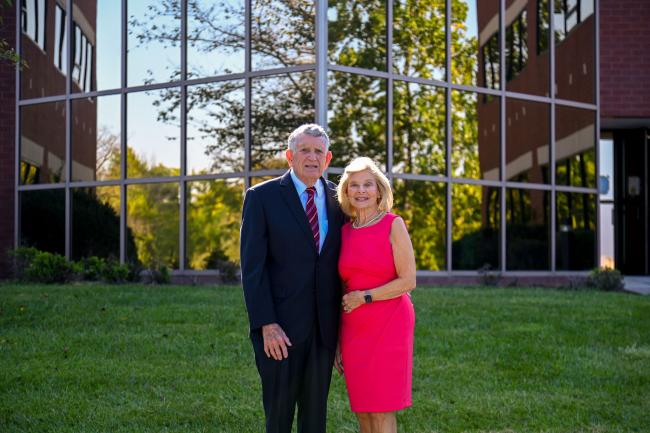 H. Pat and Nancy E. Artis standing in front of the New Health Sciences Education Building