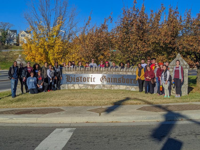 Gainsboro sign with students