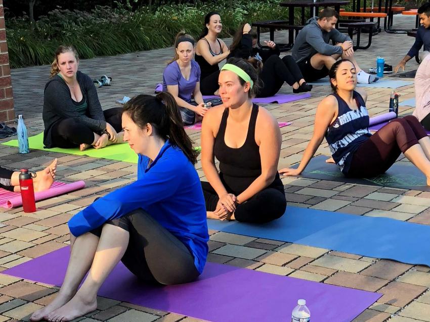 students doing yoga