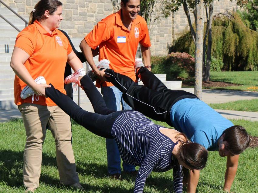 students wheelbarrow race