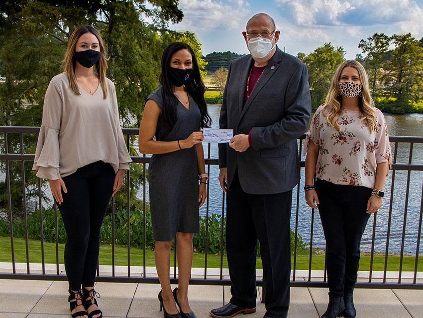 Heather Davis receiving scholarship