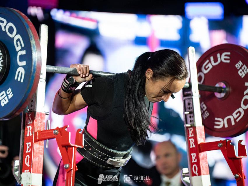 Allison Garden preparing to lift barbell