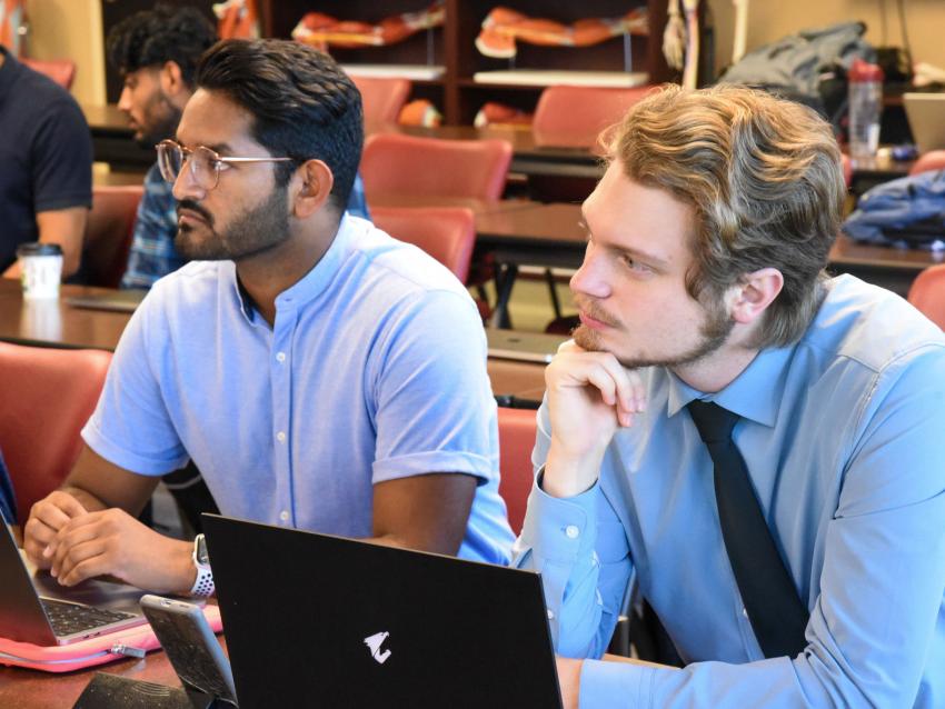 Students with laptops in lecture