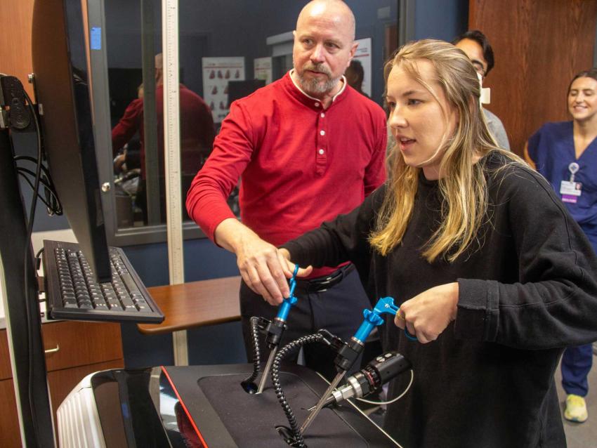 Student using the LAP Mentor Simulator