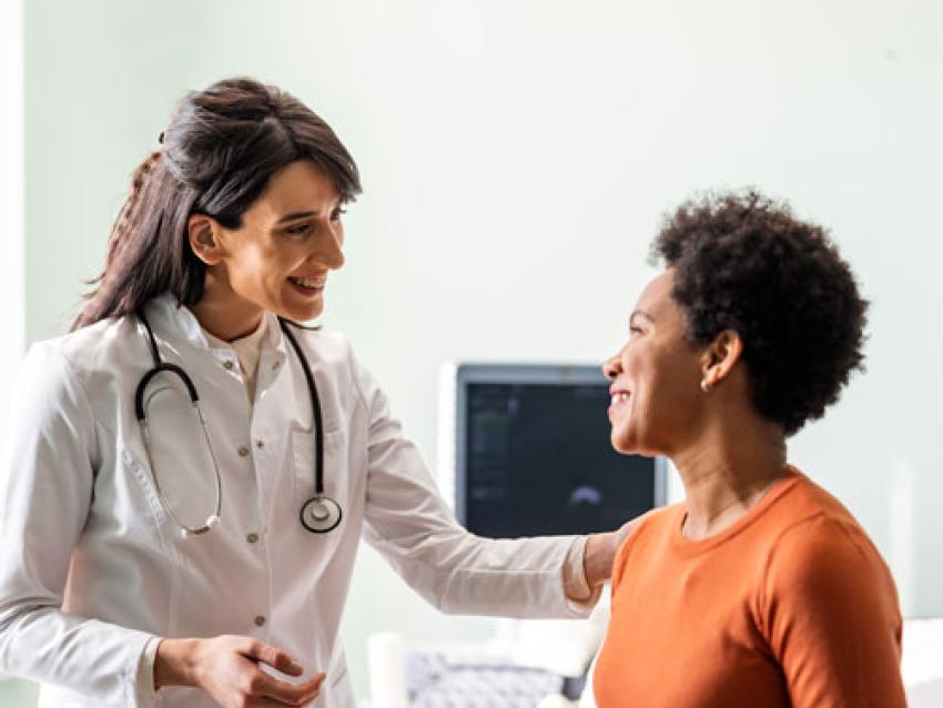 Doctor speaking with patient